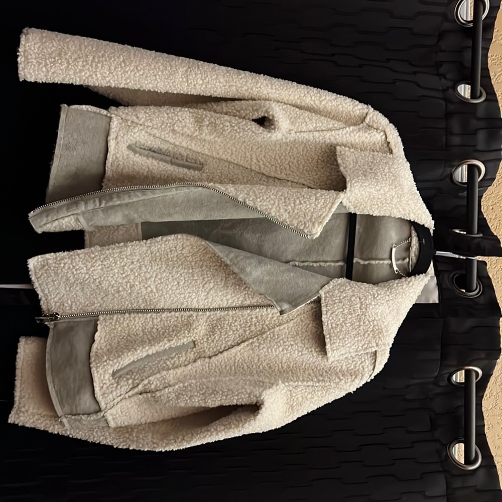 Leather and fuzzy jacket but light weight